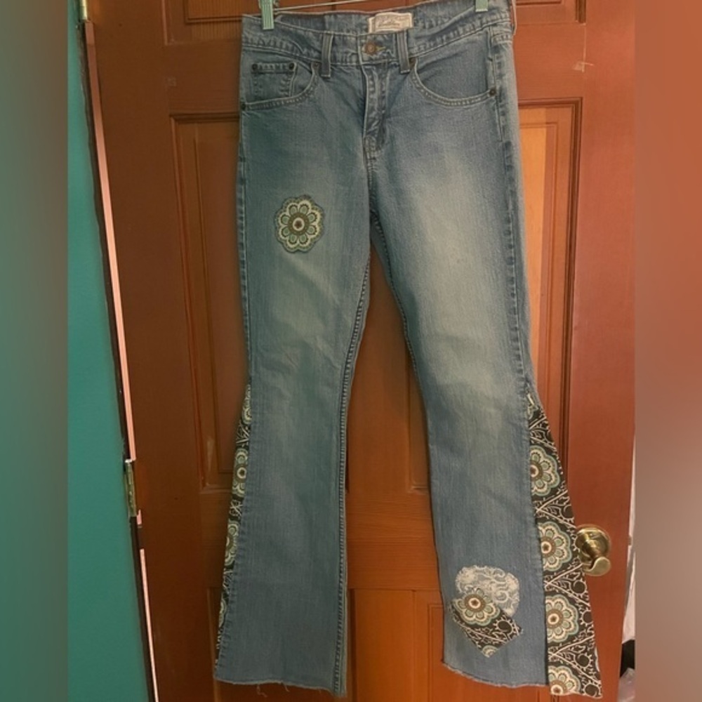 Vintage Levi’s custom patched flared jeans